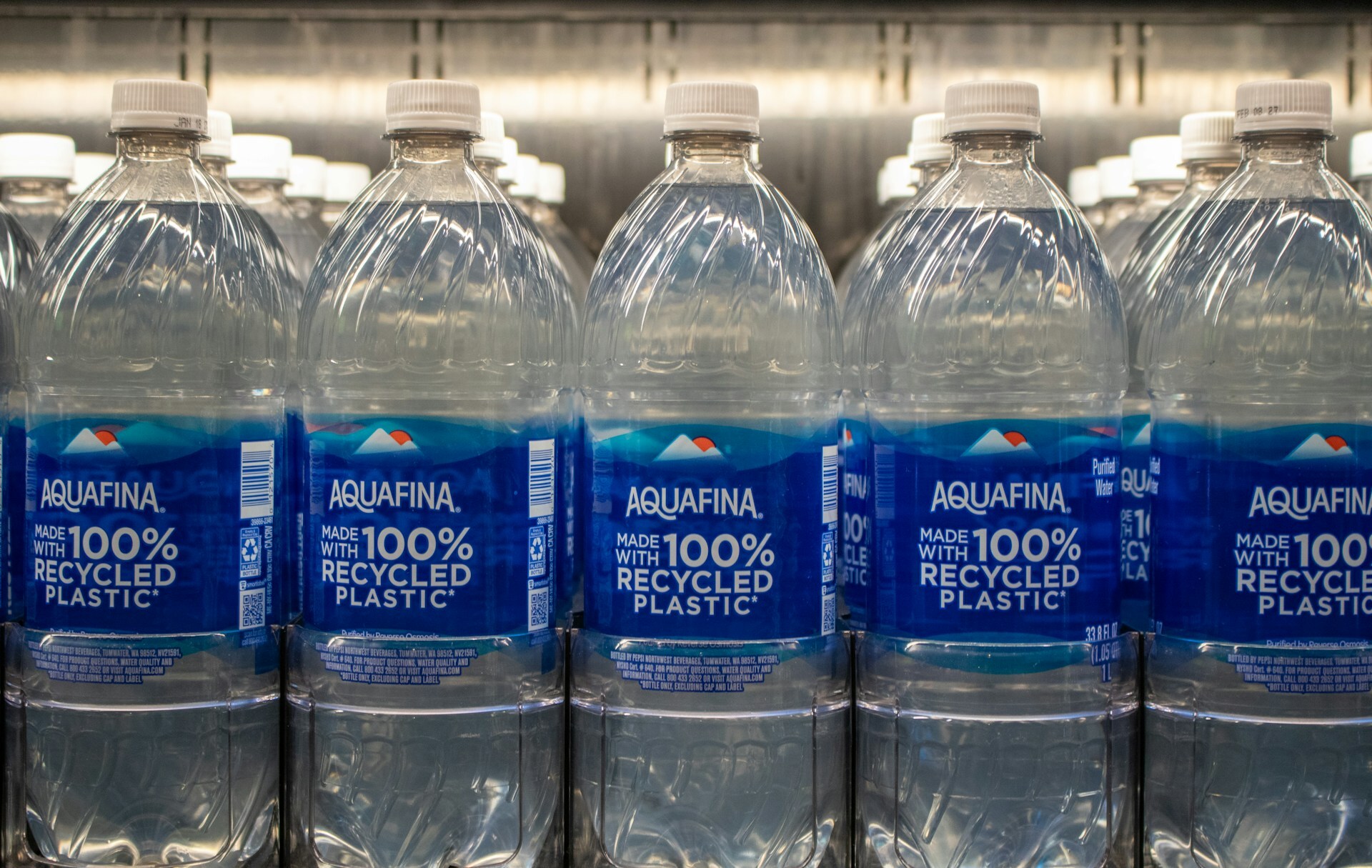 A large collection of water bottles. A large collection of water bottles.